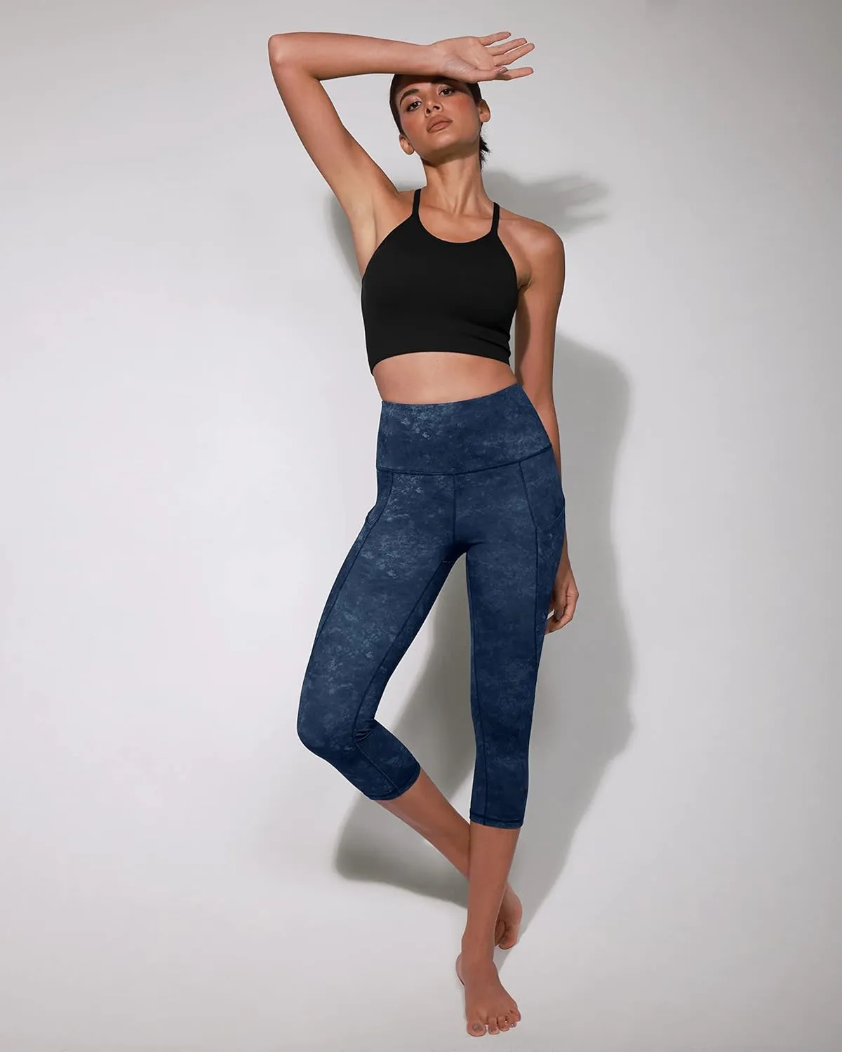 ODODOS Women's High Waisted Yoga Capris with Pockets, Tummy Control Non See Through Workout Athletic Running Capri Leggings