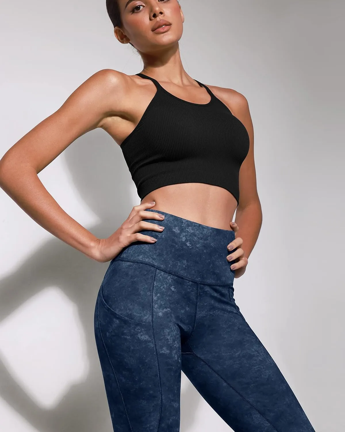 ODODOS Women's High Waisted Yoga Capris with Pockets, Tummy Control Non See Through Workout Athletic Running Capri Leggings
