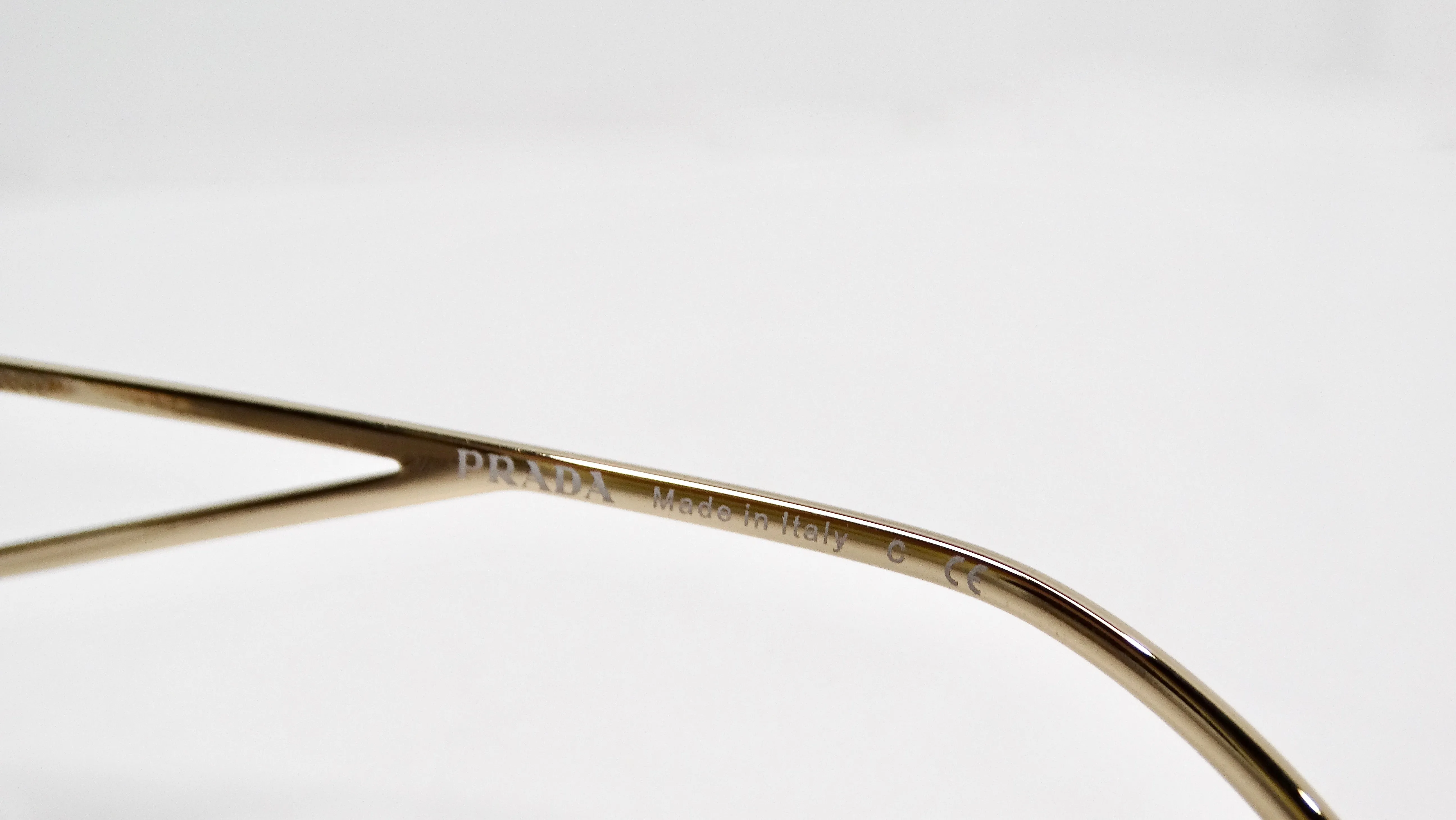 Prada 57Y Gold-Tone Metal Frame Logo Aviator Sunglasses